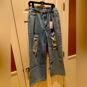 Princess Polly ripped jeans - NWT.  Size 8